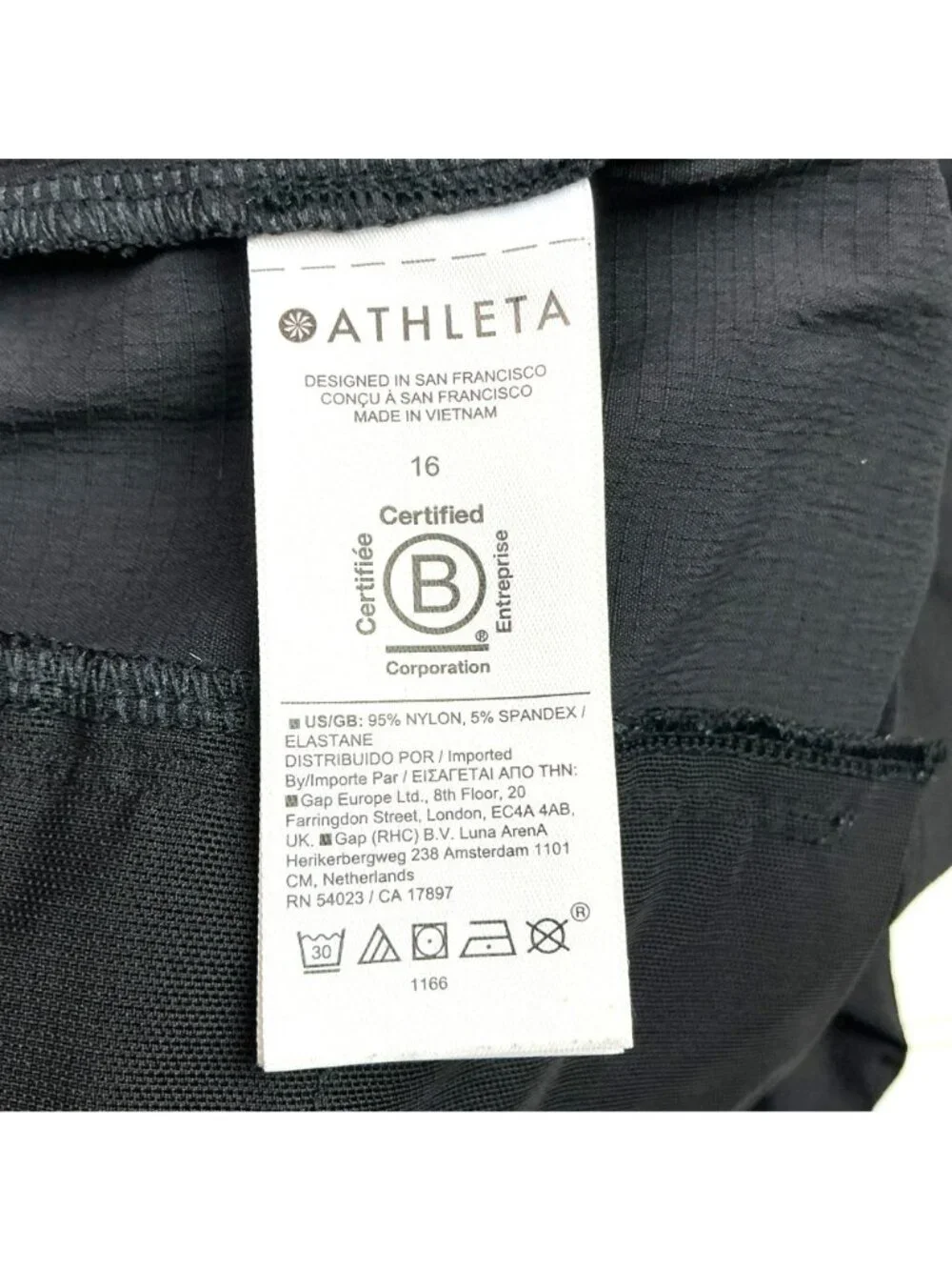 Athleta Nylon Stretch Zippered Pocket Shorts Womens 16 Black